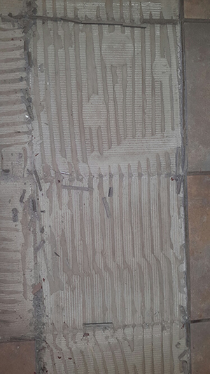 adhesive-stuck-to-tile-not-floor-4